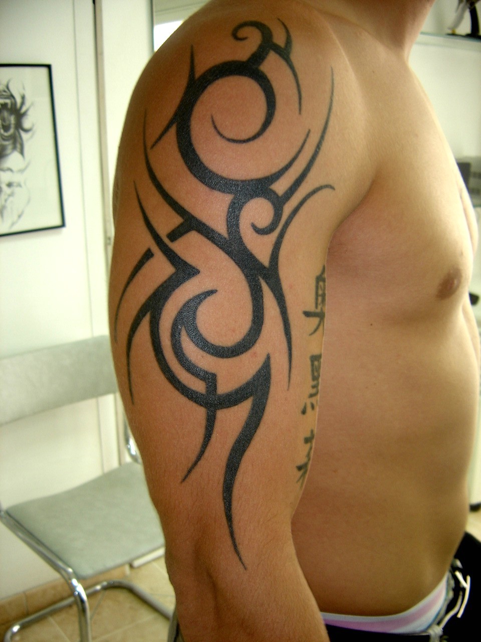 Tribal tattoo homme