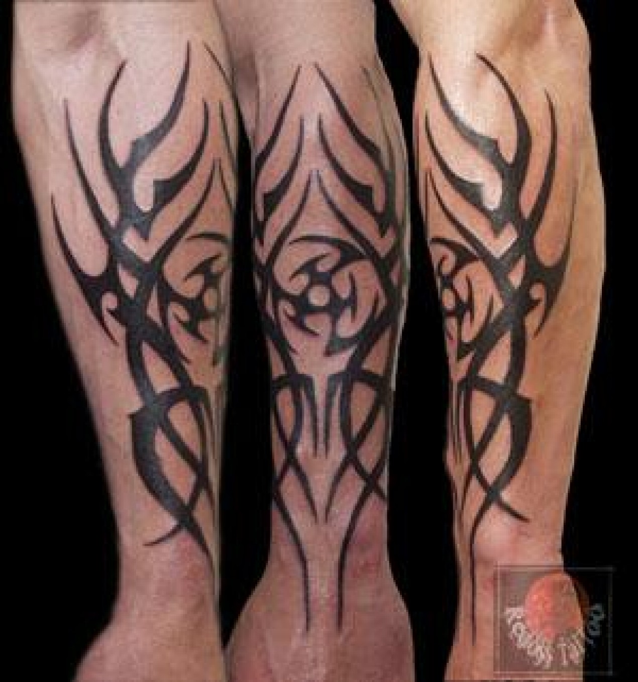 Photo tatouage tribal avant bras homme - young planneur