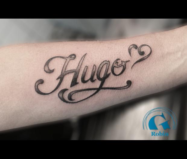 Tatouage prenom avant bras homme
